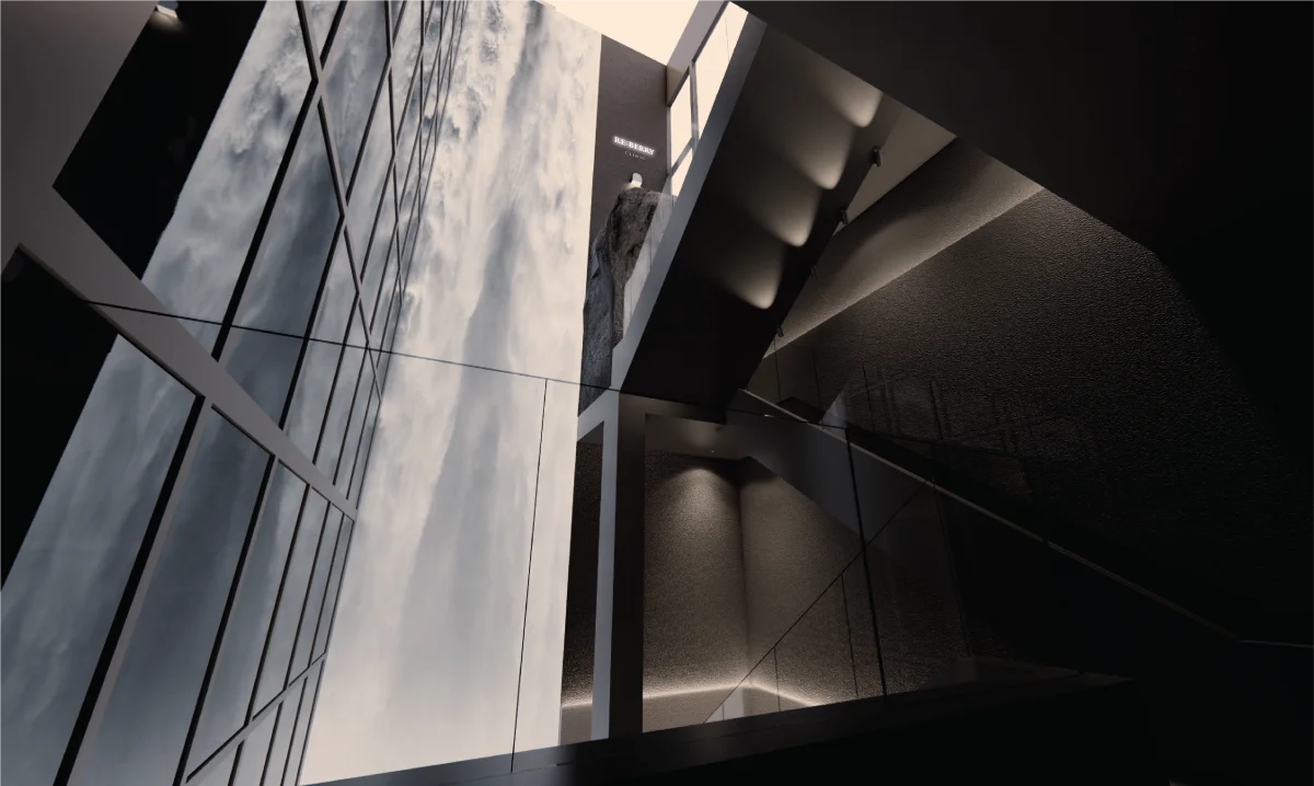RE:BERRY Clinic Gangnam all-black gallery entrance — stone cave entrance with RB logo and luxury interior design Seoul