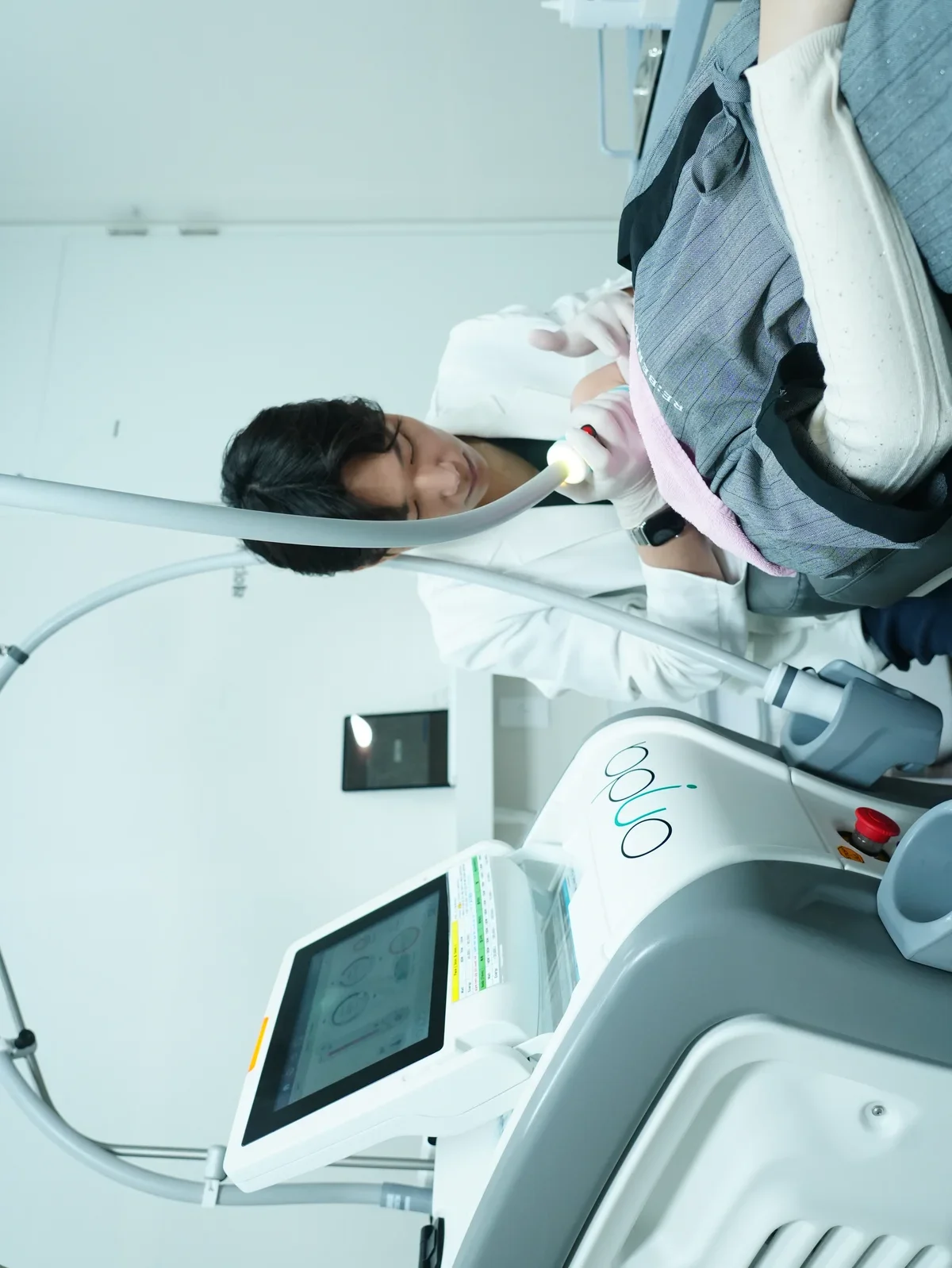 Doctor performing V-line thread lift at Korean clinic