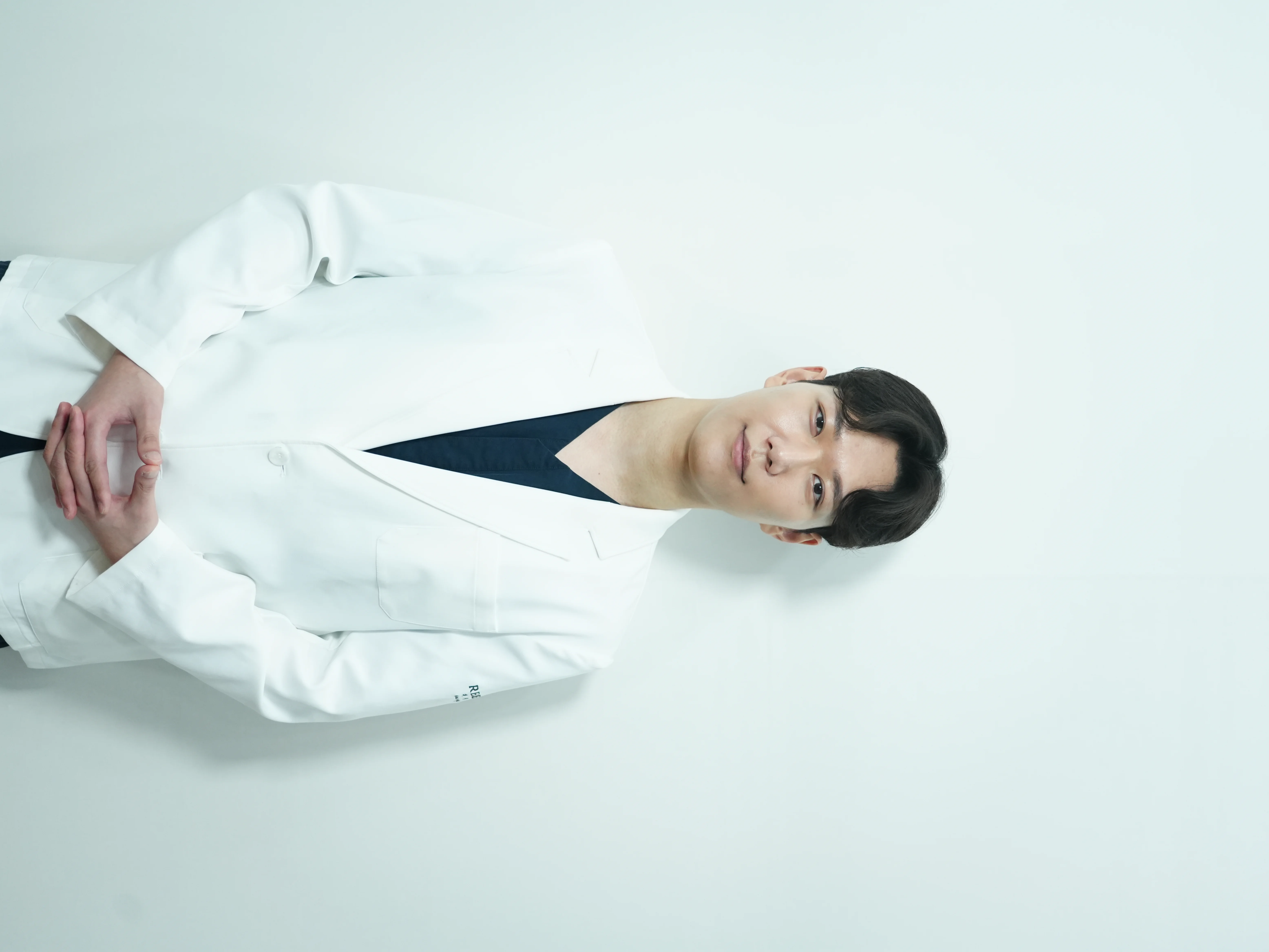 Dr. Kim Dong-Young performing skin assessment for Asian laser patient at RE:BERRY Incheon